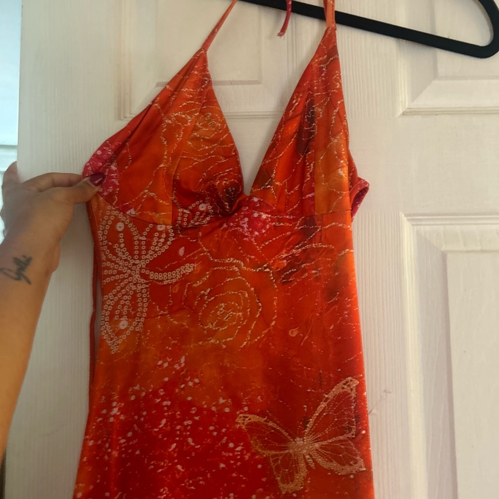 Vibrant Orange Halter Dress with Butterfly Design